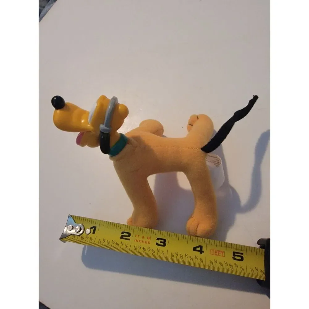 DISNEY'S Pluto 4